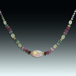"With pomp, with triumph, with dances and delights" 18K, opal and tourmaline necklace